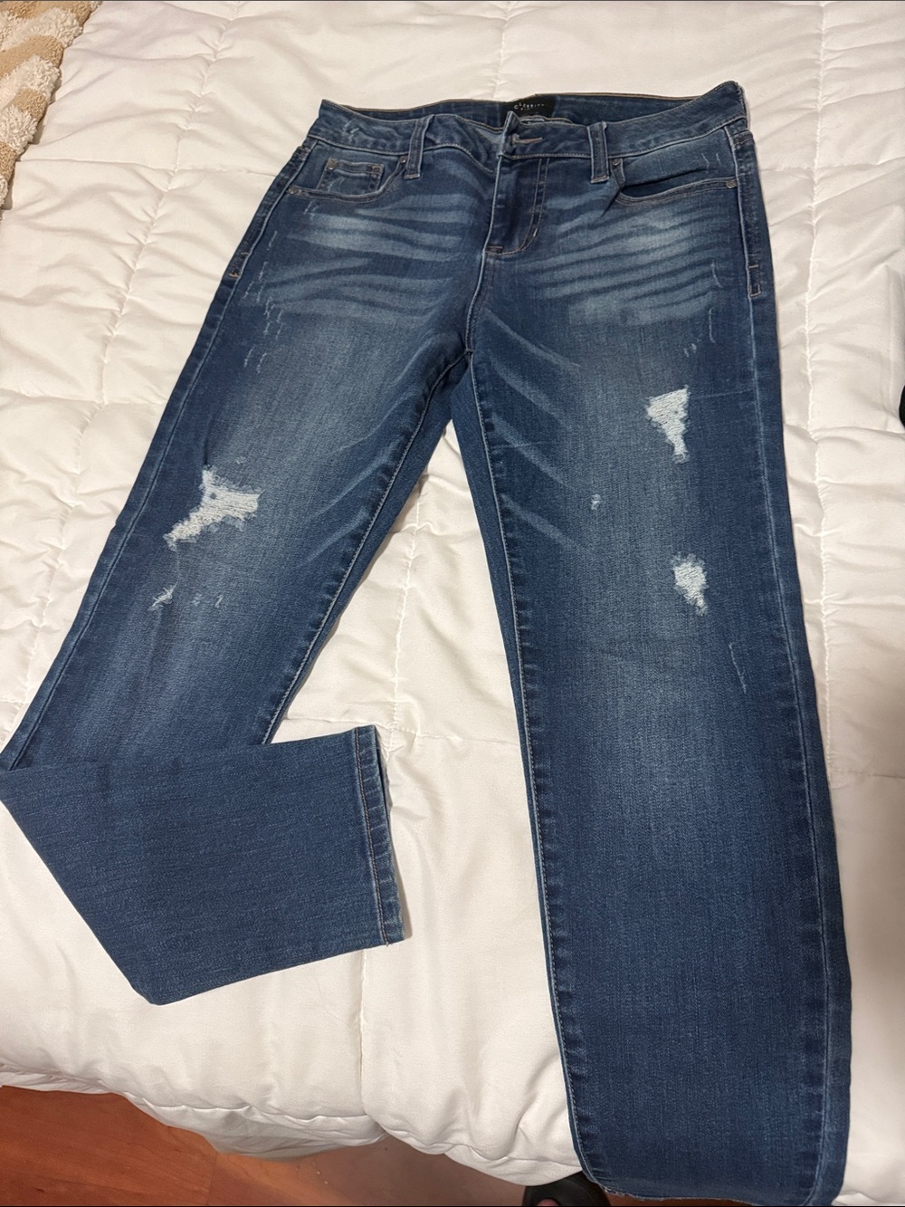 Women’s Distressed Dark Blue Jeans